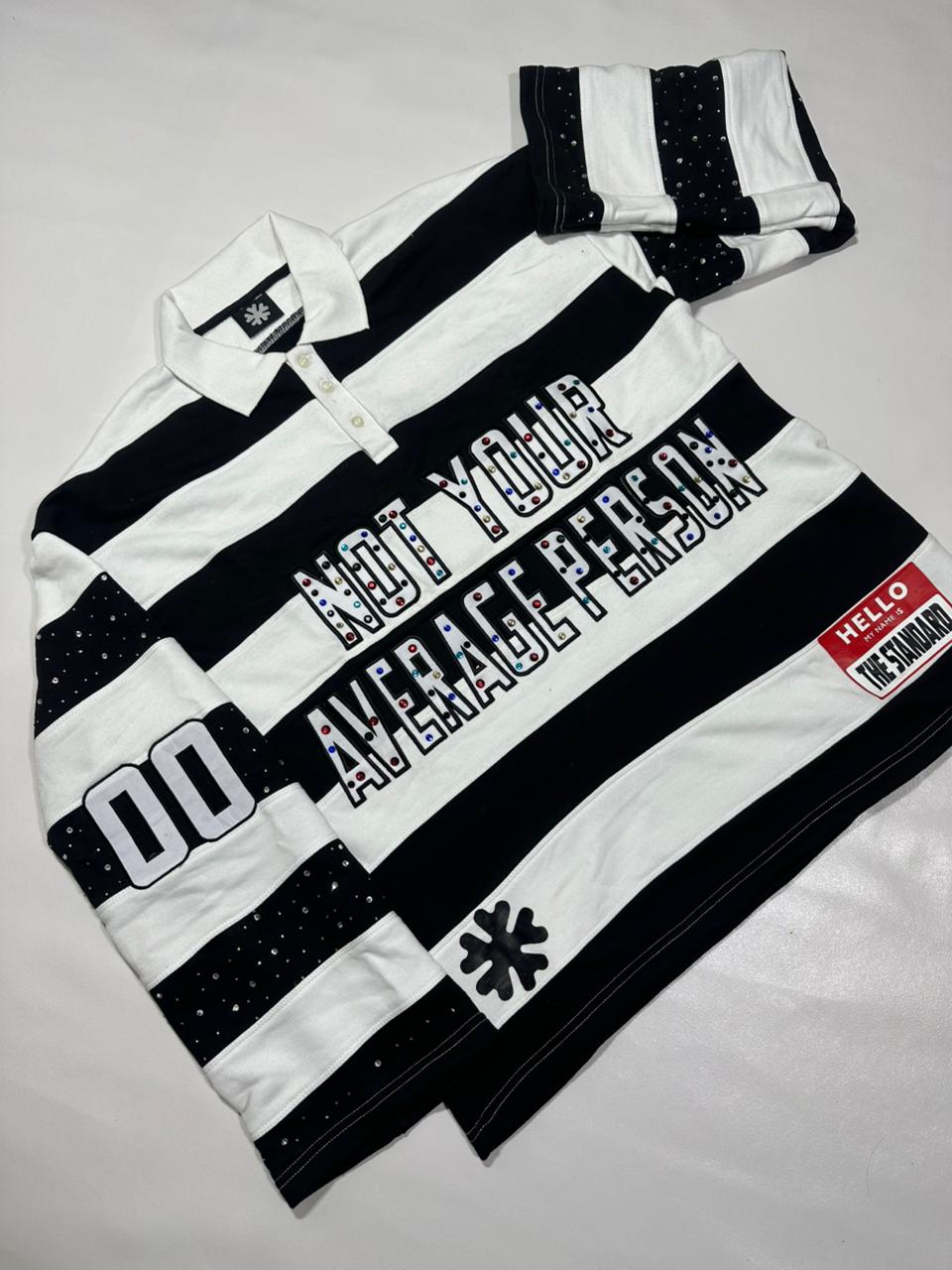 Black "NOT YOUR AVRAGE PERSON" Polo